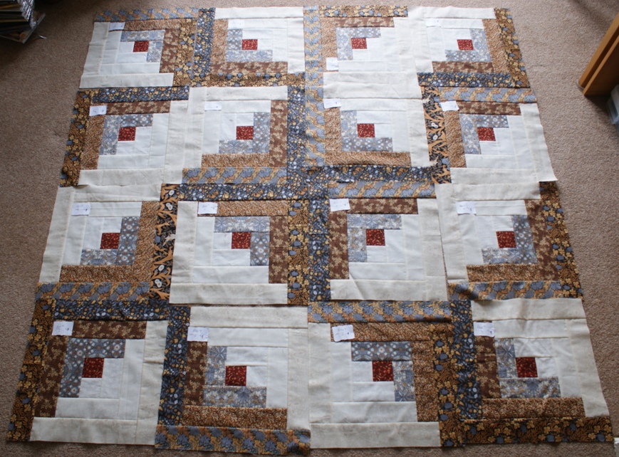 The 'Whirligig' design I've decided to use for my quilt. Note the wrongly rotated block - row 1 block 3, despite my labeling system!