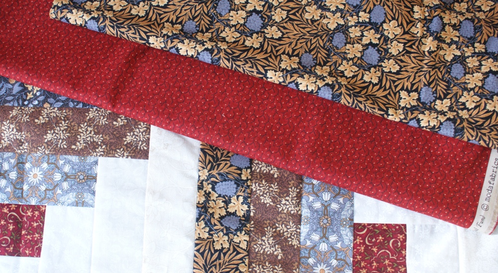 Purchase 3: Yeah! The border fabrics for the log cabin quilt.