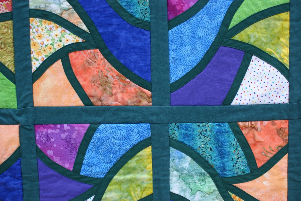 A close up of my stained glass quilt. It was lovely putting all the jewel coloured fabrics together.