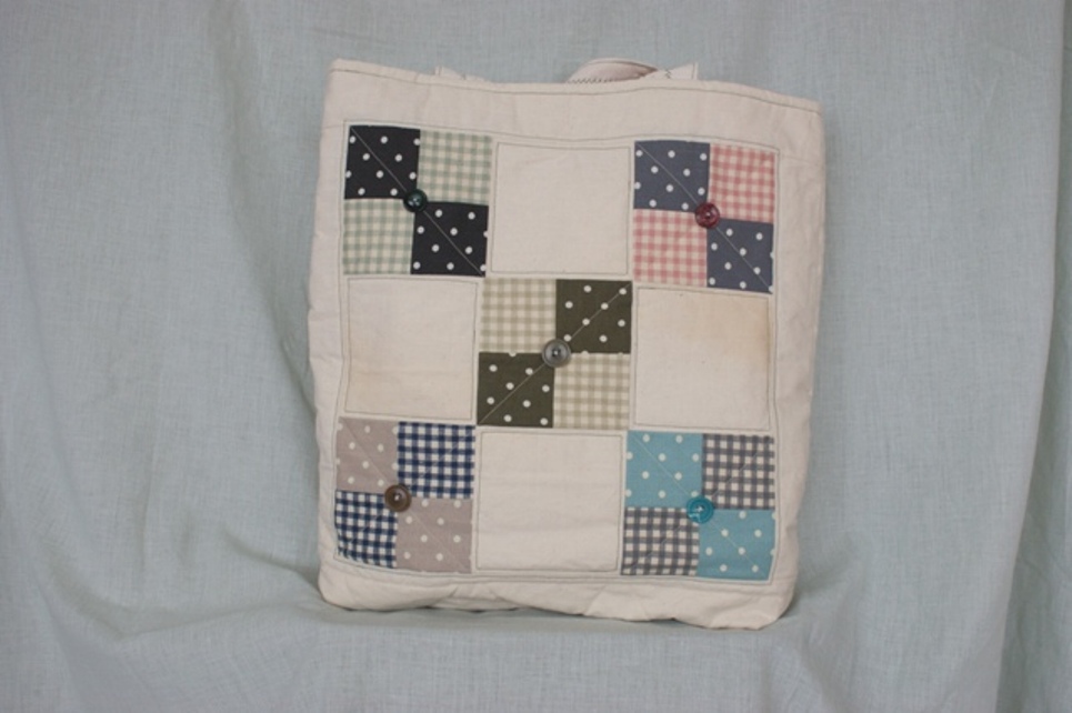 This isn't THE first bag but it's similar!
