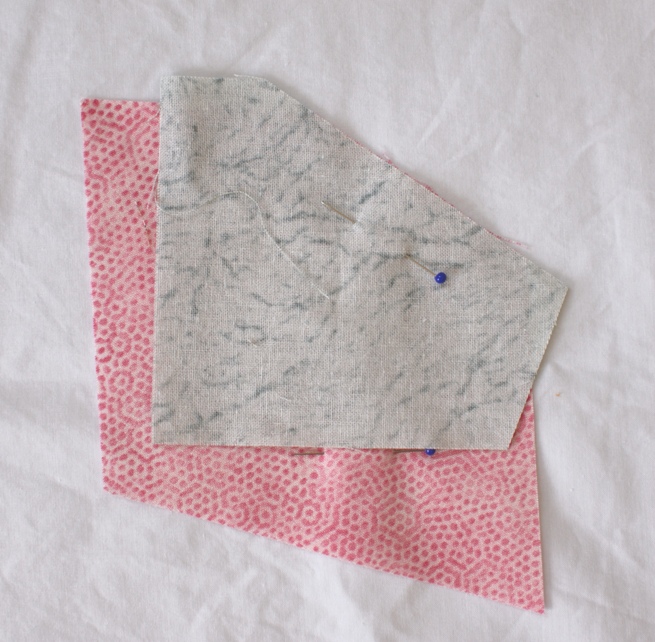 Pin the second piece face down on the centre piece. Make sure you have a straight edge to sew the seam along - the finished block won't lie flat if the seams curve! otherwis