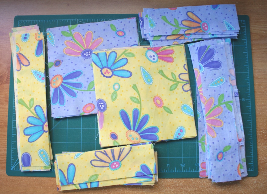 Little piles of leftover loveliness cut ready to be pieced!