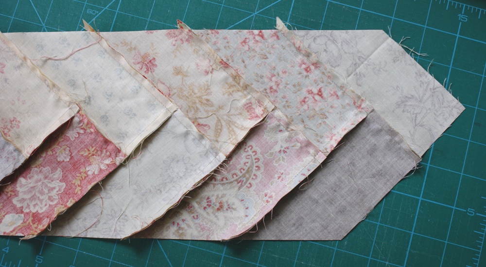 The pieces need gentle handling as the exposed edges of the braid are stretchy bias.  A quick finger press is enough at theis stage to get seams lieing in a consistent direction.