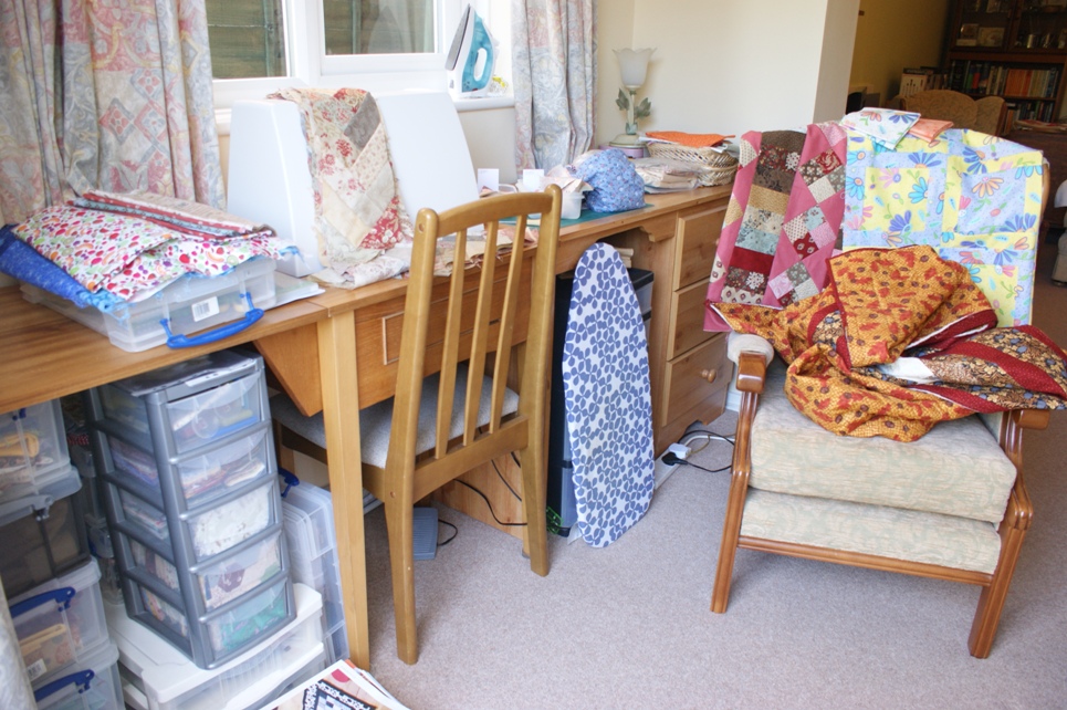 My sewing corner at 8.45 this morning - I was glad to run out the house with four WIP swamping the machine and at least two piles of fabric sorted and ready for projects in mind! 