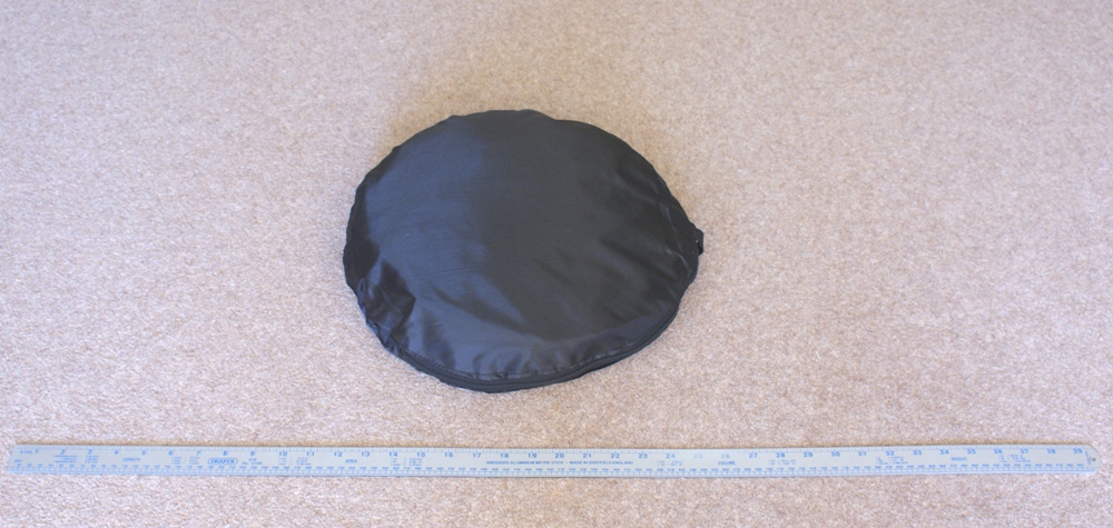The bag containing the photographic light cube (note the metre ruler in front).