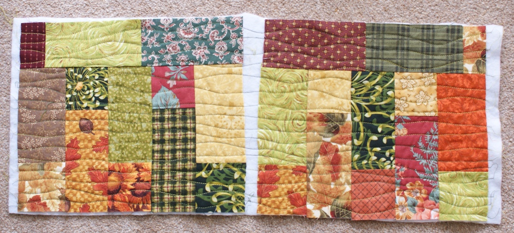 The front and back of my purse quilted on the same piece of wadding - this saved a bit of time starting and finishing each row of stitching!
