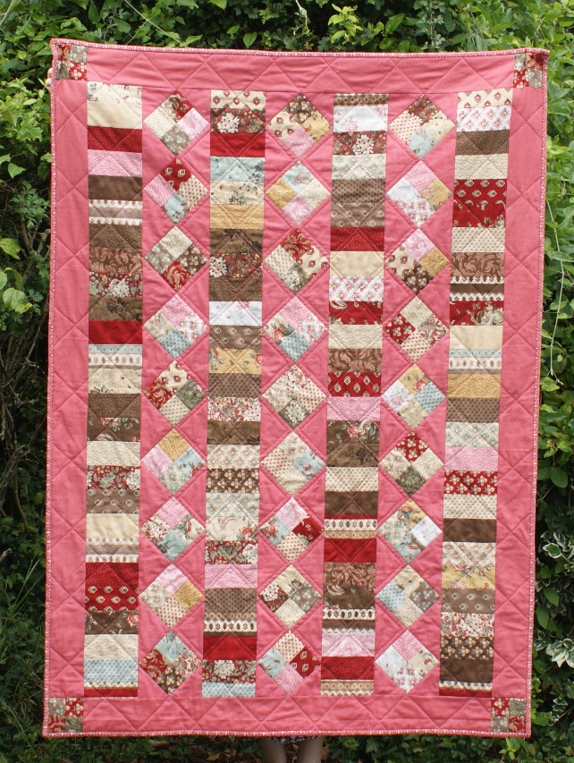 'Charms and Coins' quilt. Using Moda's Collection for a Cause, Community, charm packs.