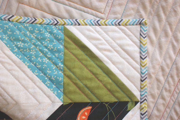 I am so happy with the binding fabric on this project. It's 'Lime Twist Chevron' by the Henley Studio for Makower UK