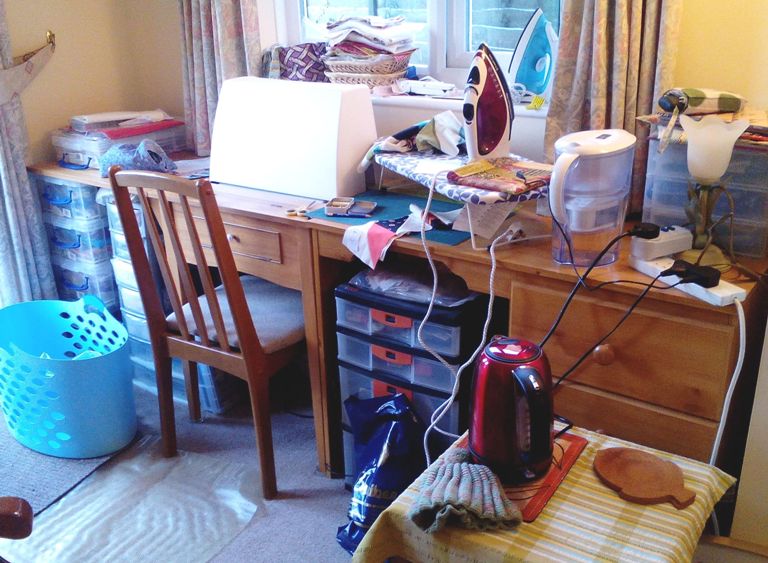 My poor cluttered sewing space :-(