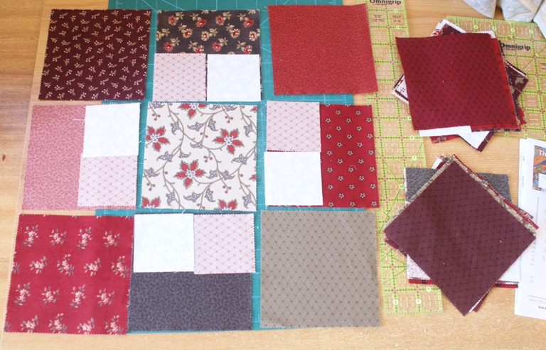 I chose to use 5" squares from a charm pack, Richmond Reds by Barbara Brannock for Moda.