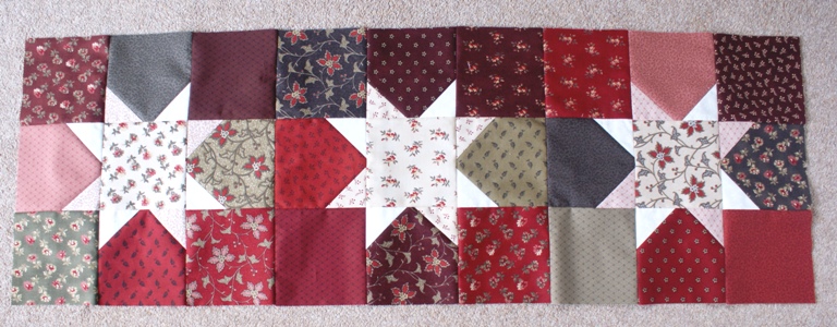 The three blocks sewn together to make the top of the tablerunner.