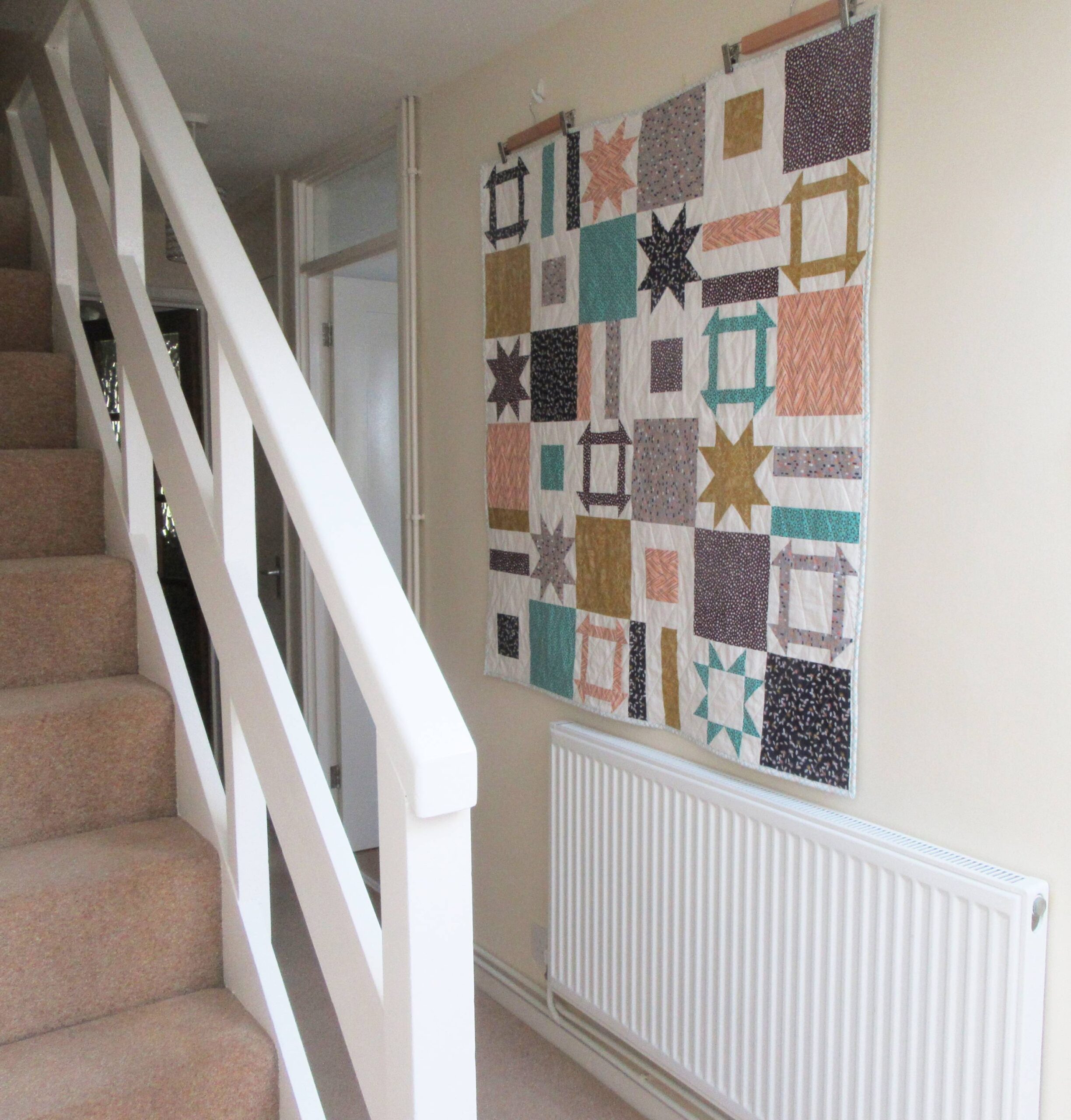 Dashing Stars hanging in the hall by Allison Reid