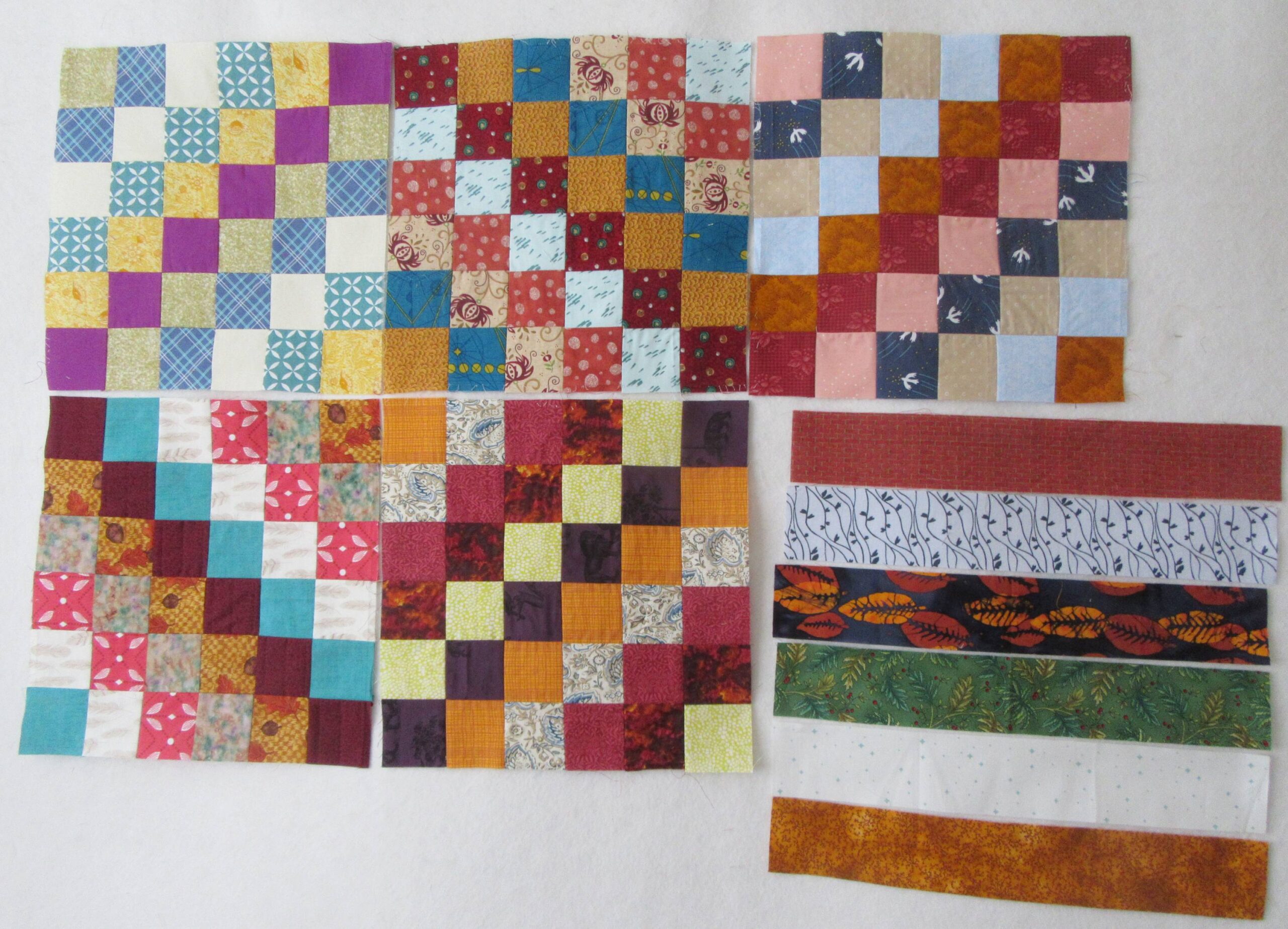Five Trip Around the World blocks by Allison Reid