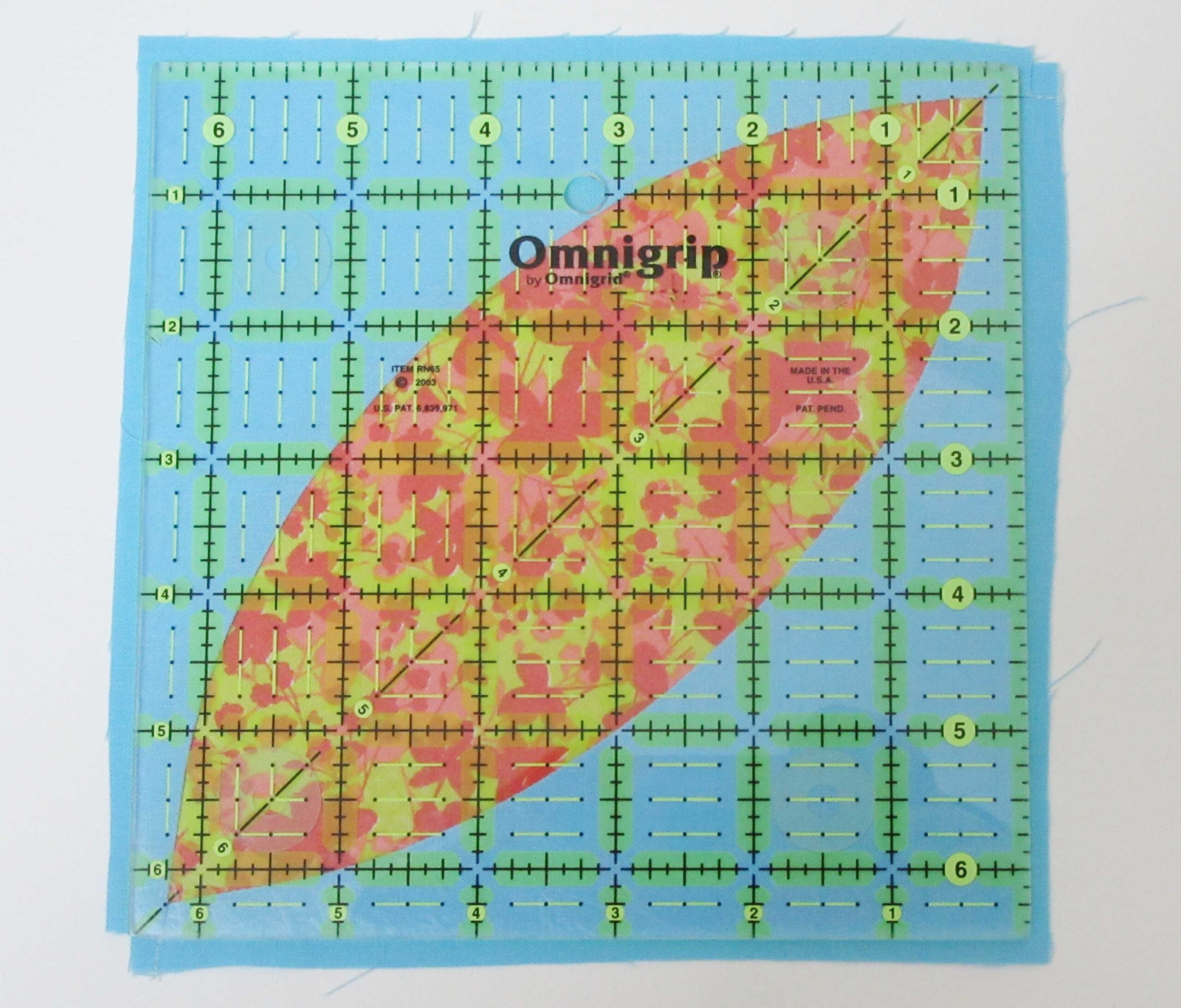 Trimming the Orange Peel block by Allison Reid