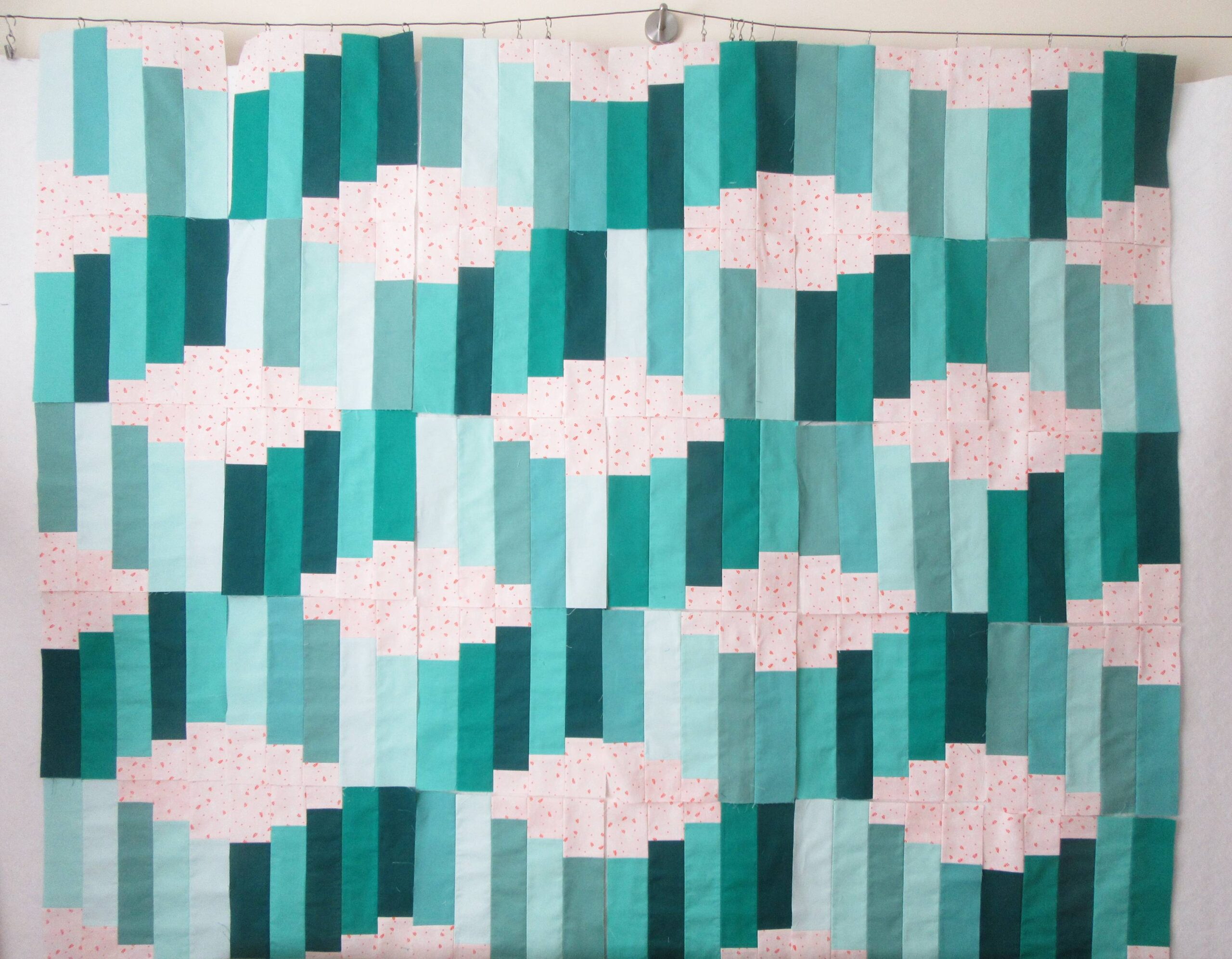 Jelly Roll Waves blocks on the design wall by Allison Reid