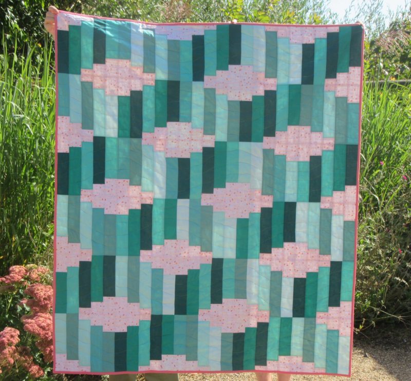 Jelly Roll Waves finished with holder-uppers by Allison Reid