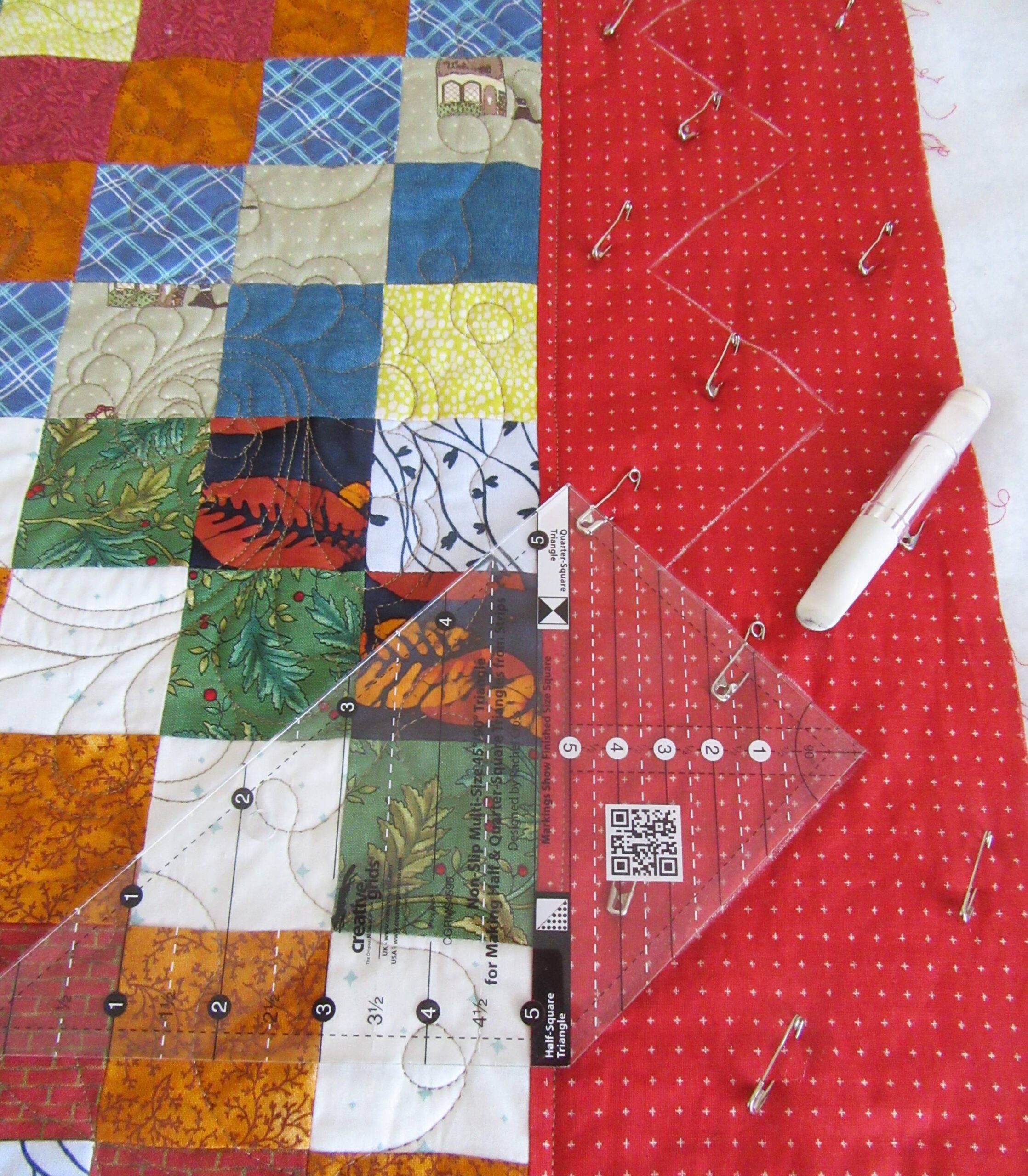 Scrappy Trip Along marking the border quilting by Allison Reid