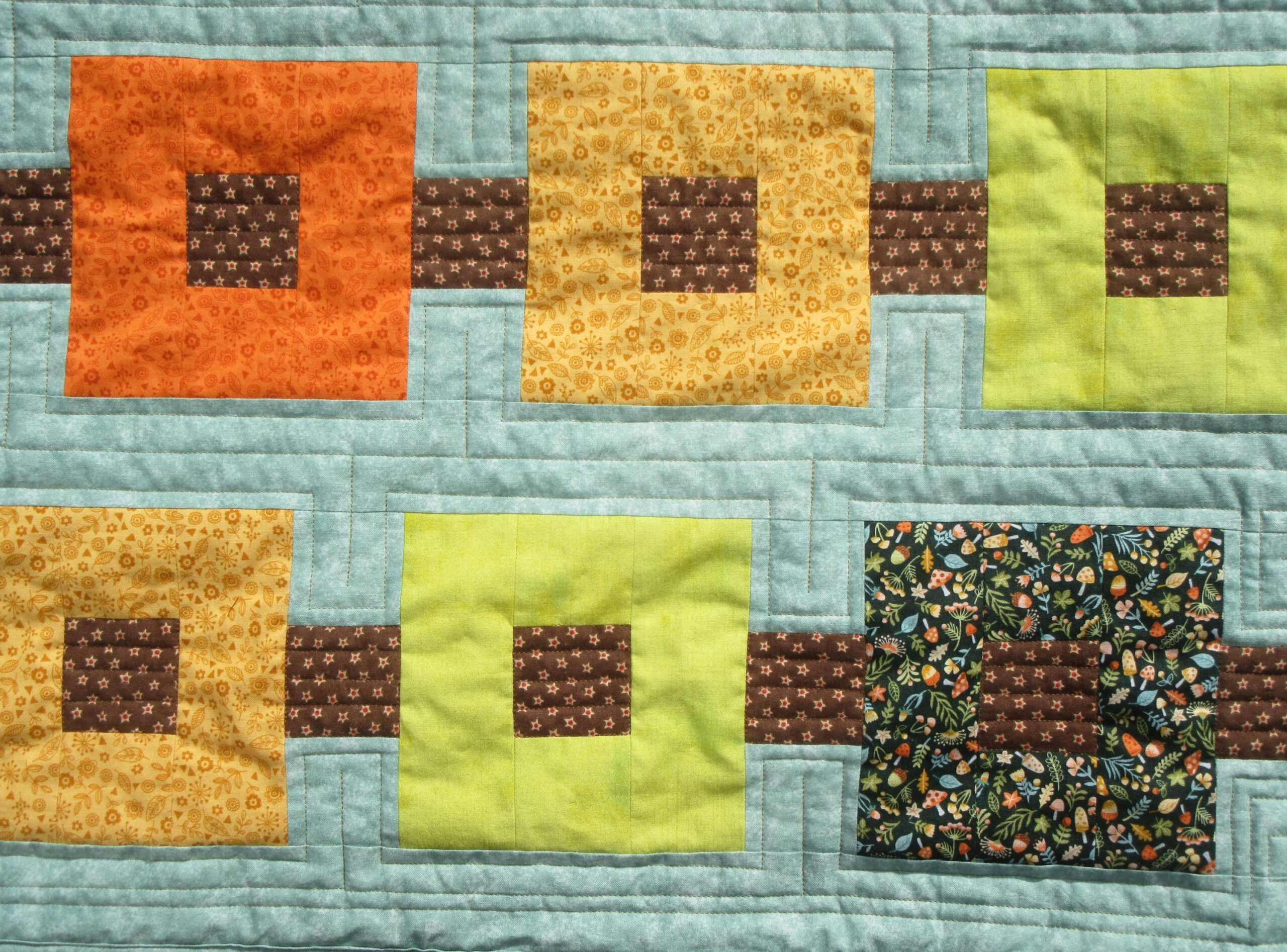 Autumn wallhanging finished top close up by Allison Reid