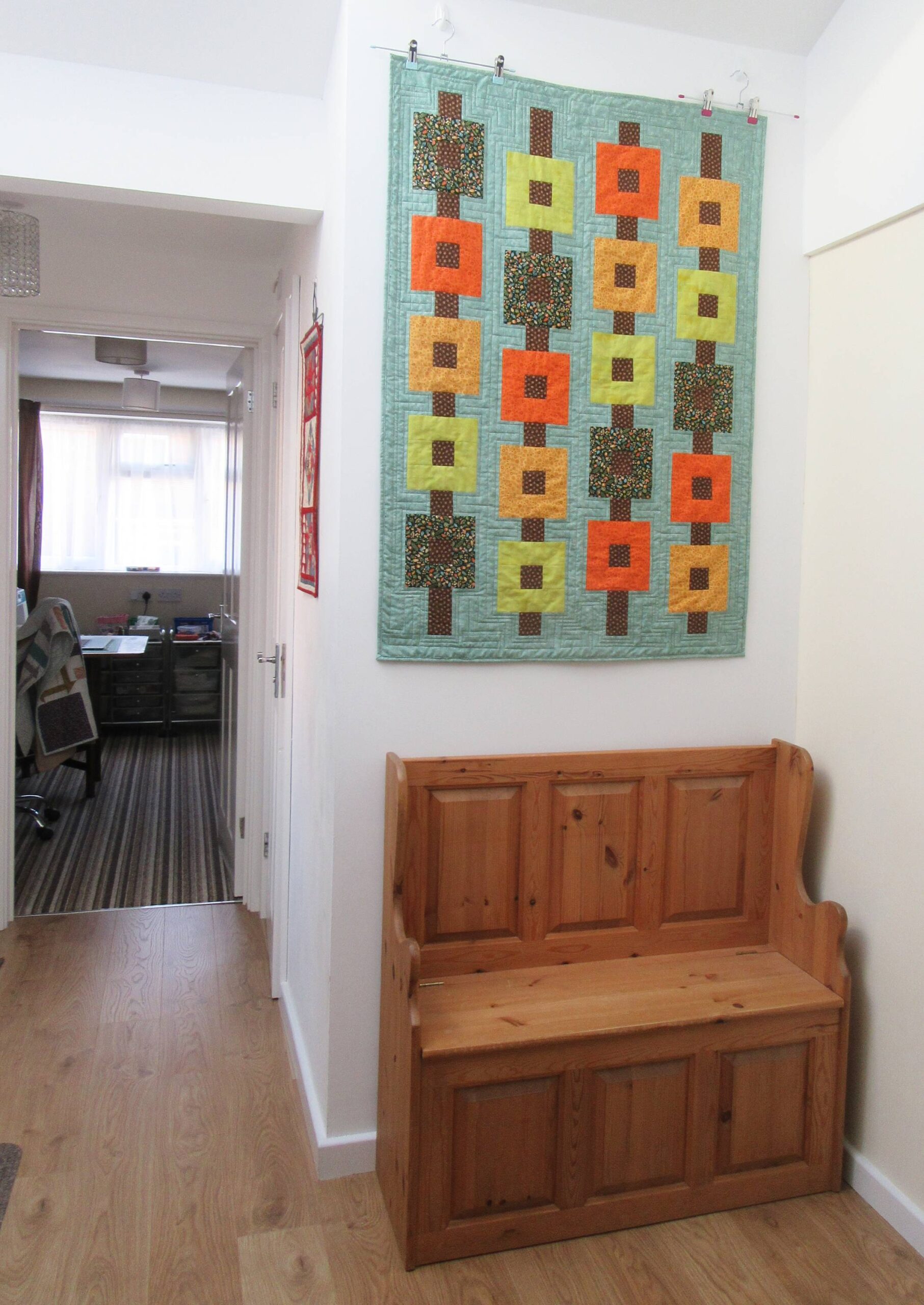 Autumn wallhanging on the wall by Allison Reid