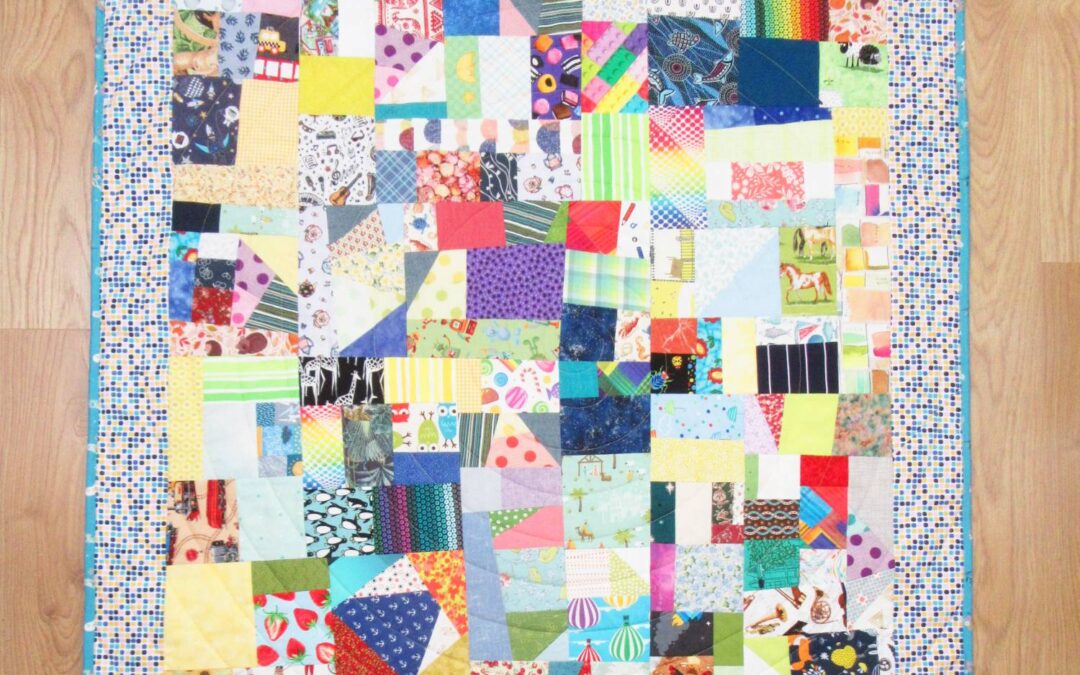 Mixing I-Spy Fabrics into a Scrap Vortex is a Win Win!